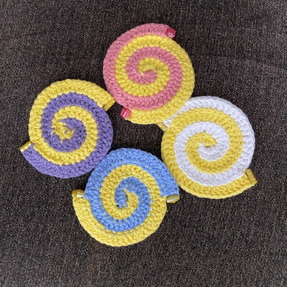 Coasters cotton crocheted multi colored 4” across.